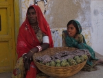 Mother and daughter with custard fruit