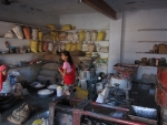 Women with flour mill and oil press in Narlai